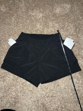 Lululemon Women's Black Athletic Shorts with Elastic Waistband and Side Pockets
